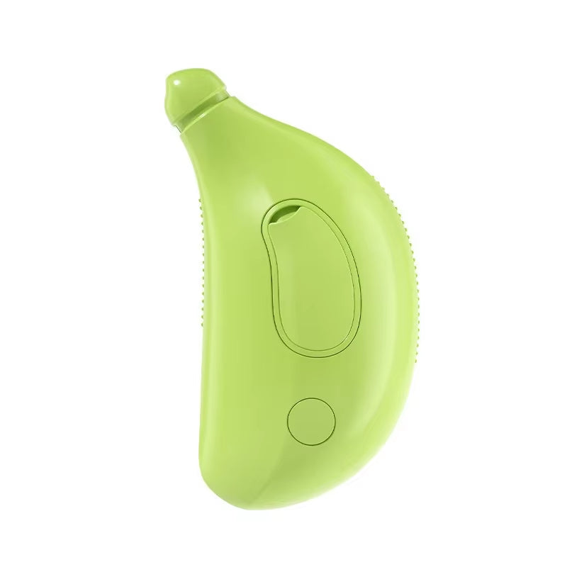 Green banana-style grooming brush for pets β soft grip and gentle bristles