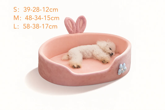 Pink bunny-eared pet bed with a sleeping white dog, size measurements in centimeters shown on a white background