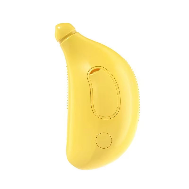 Yellow banana-shaped pet brush with soft silicone bristles – novelty design for grooming fun