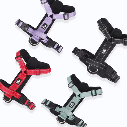 Four anti-escape dog harnesses in different colors – side and top views shown for comparison