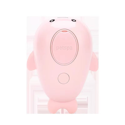 Pink PetSpa electric grooming brush for dogs and cats – automatic fur removal with seal-inspired design