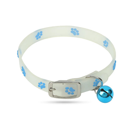 White silicone cat collar with blue paw prints and metallic blue bell, shown on a clean white background